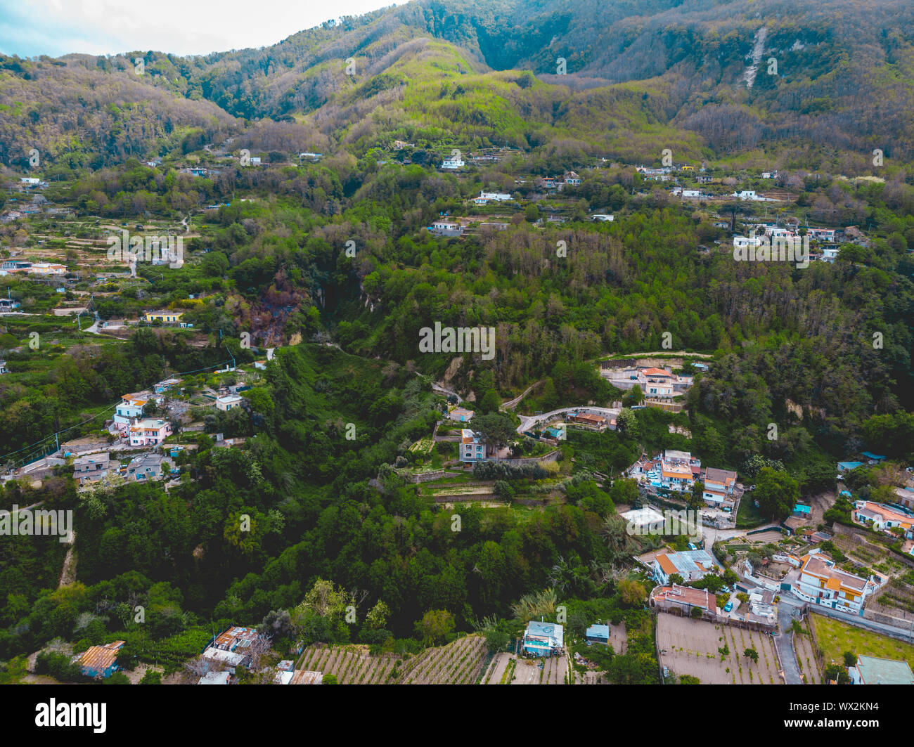 buildings in the mountains at ischia island from the drone view Stock Photo