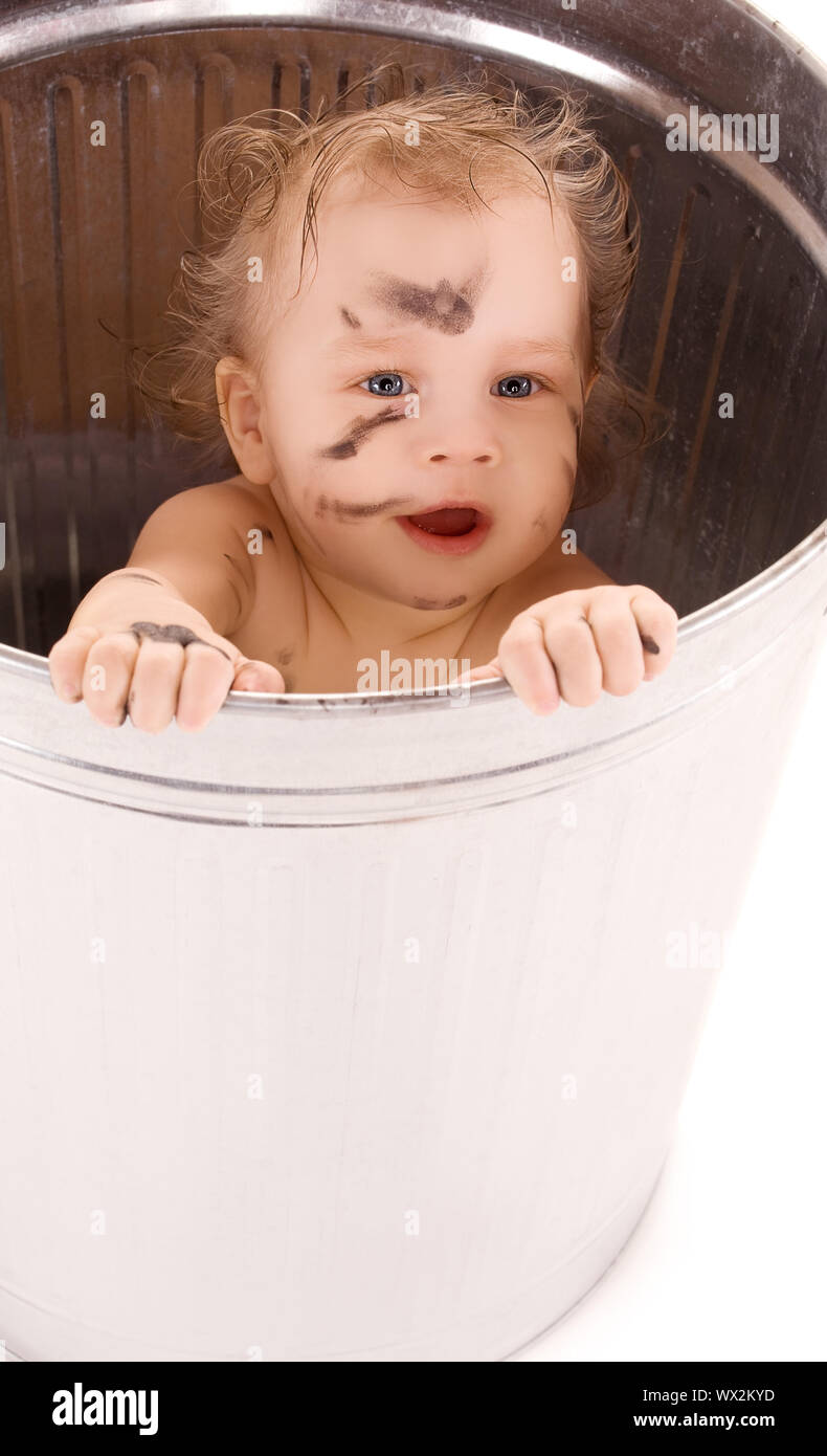 baby in trash can Stock Photo Alamy