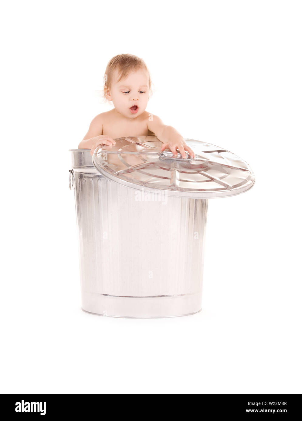baby in trash can Stock Photo Alamy
