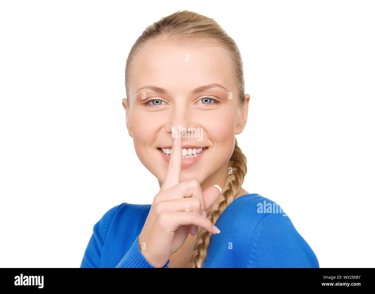 bright picture of teenage girl with finger on lips Stock Photo - Alamy