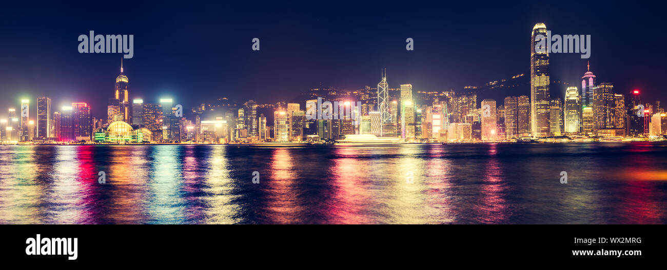 Hong Kong skyline at night. Panorama Stock Photo