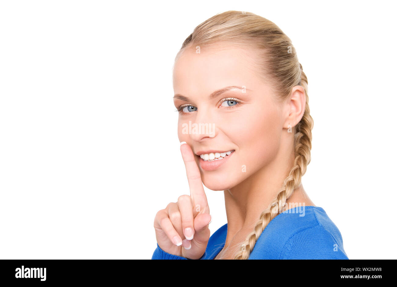 bright picture of teenage girl with finger on lips Stock Photo - Alamy