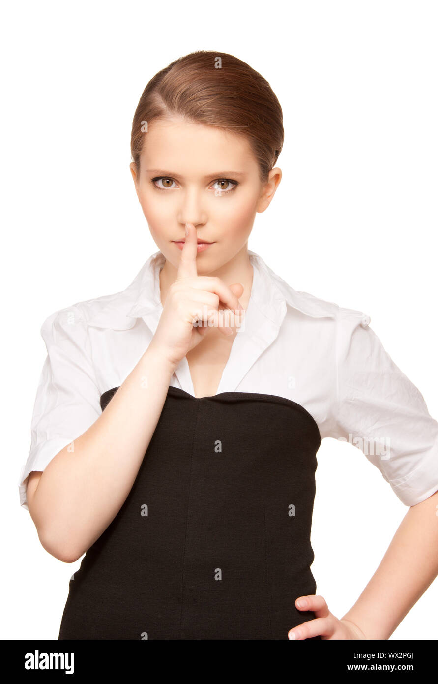 bright picture of teenage girl with finger on lips Stock Photo - Alamy