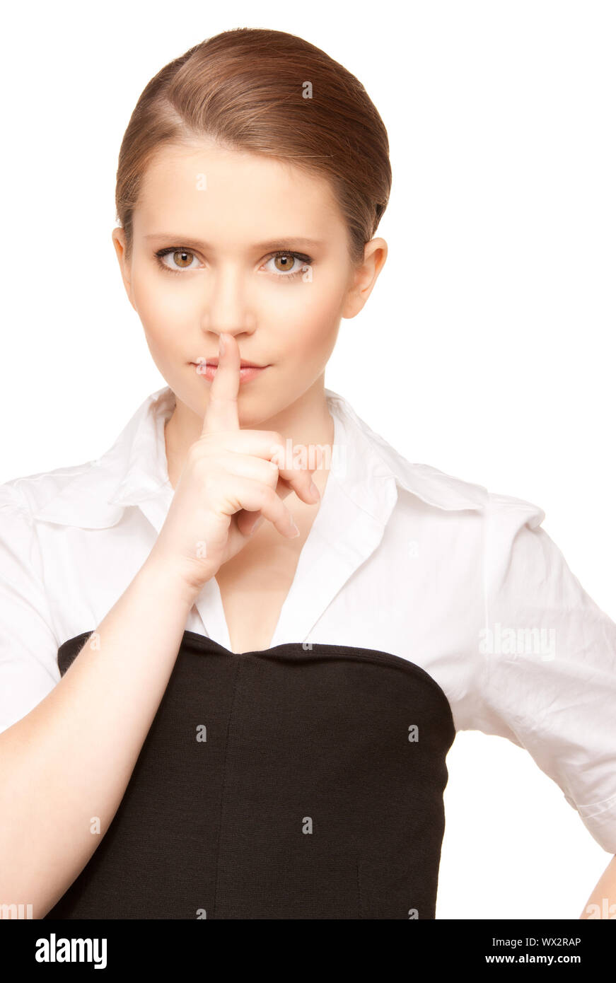 bright picture of teenage girl with finger on lips Stock Photo - Alamy