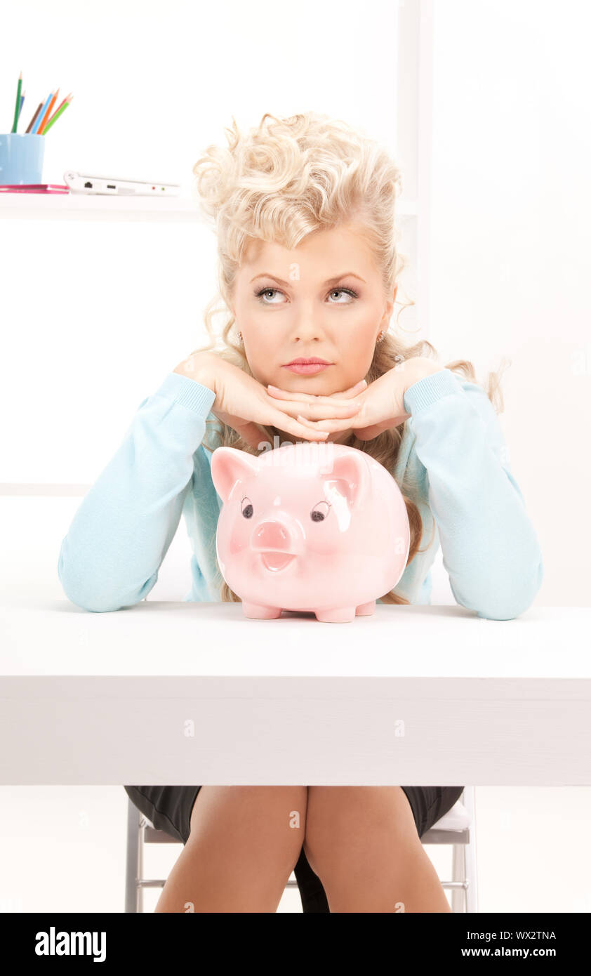 picture of lovely woman with piggy bank Stock Photo - Alamy