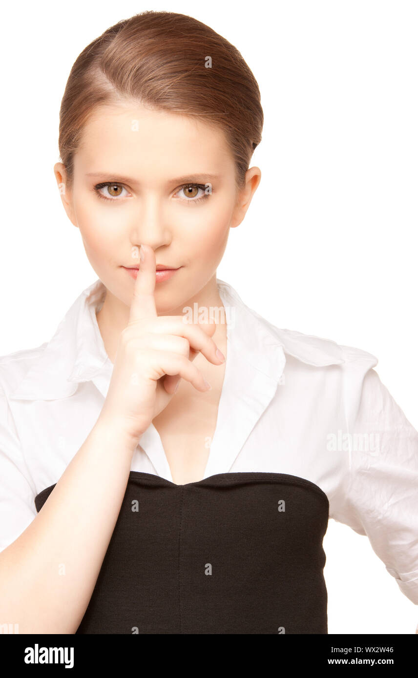 bright picture of teenage girl with finger on lips Stock Photo - Alamy