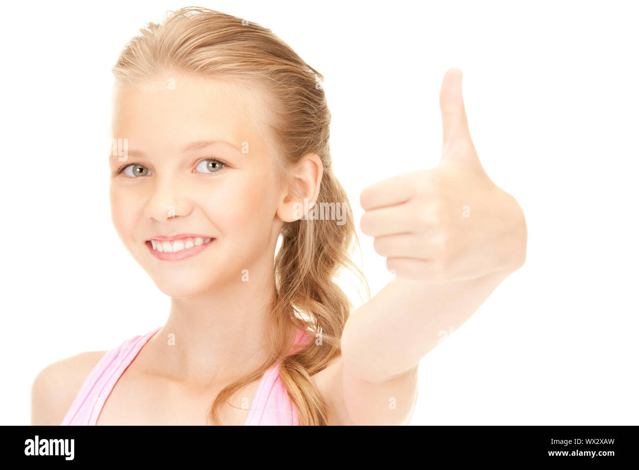 bright picture of lovely girl showing thumbs up sign Stock Photo - Alamy