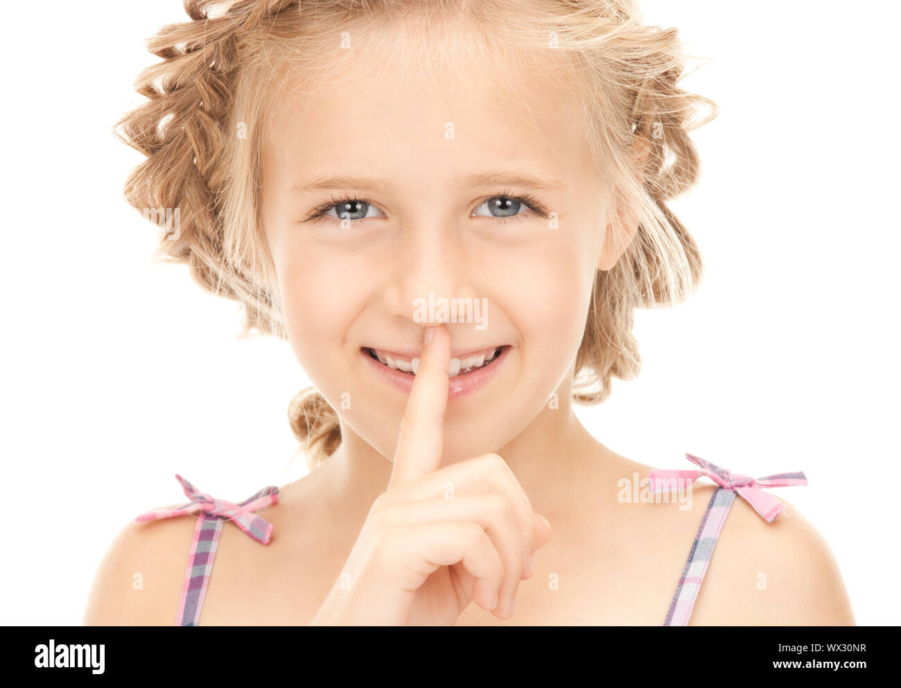 bright picture of pretty girl with finger on lips Stock Photo - Alamy