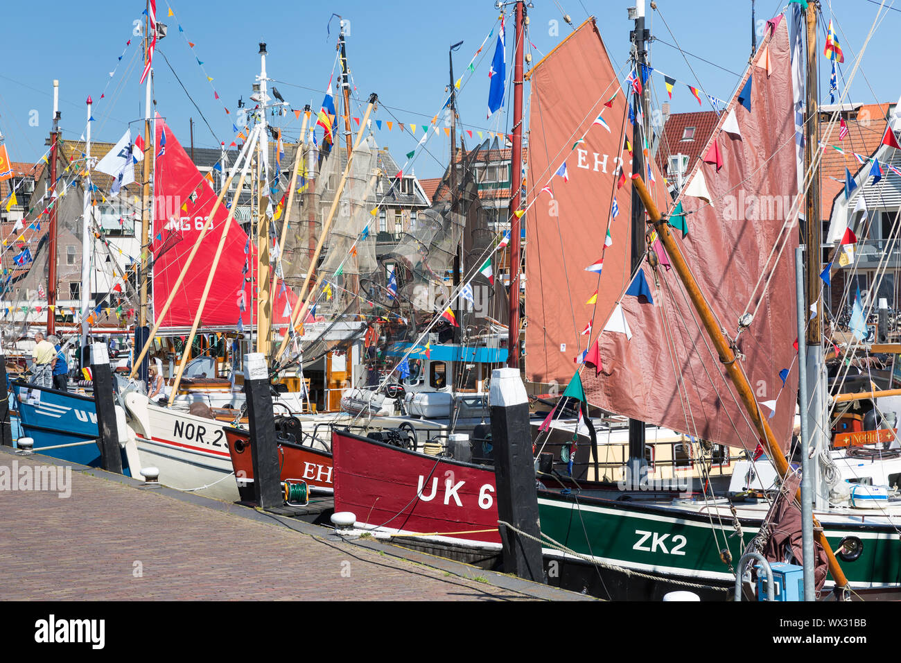 Decorated traditional fishing ships in the harbor of Urk, the Netherlands Stock Photo