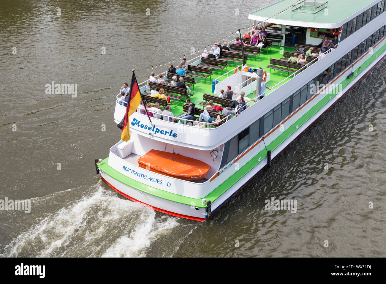 BERNKASTEL-KUES, GERMANY  - JULY 21: A tourist vessel with unknown toerists is making a cruise over the river Moselle on July 21 Stock Photo