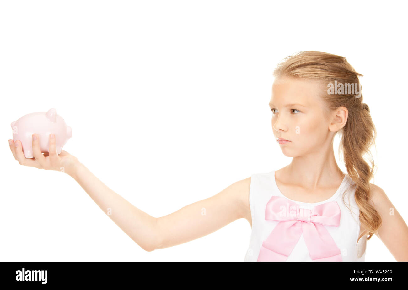 picture of lovely teenage girl with piggy bank Stock Photo