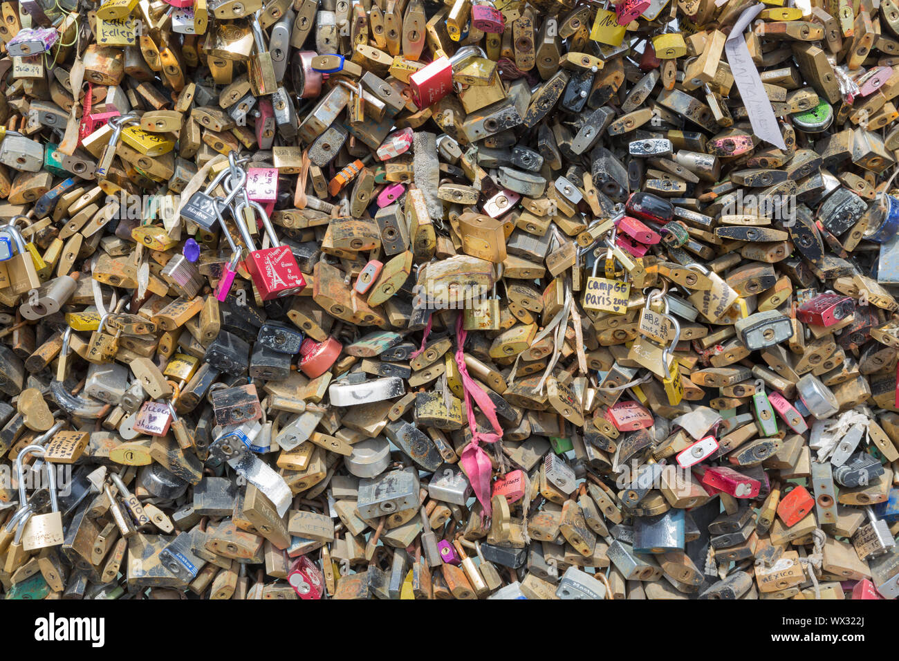 Love padlocks at bridge over river Seine in Paris, France Stock Photo