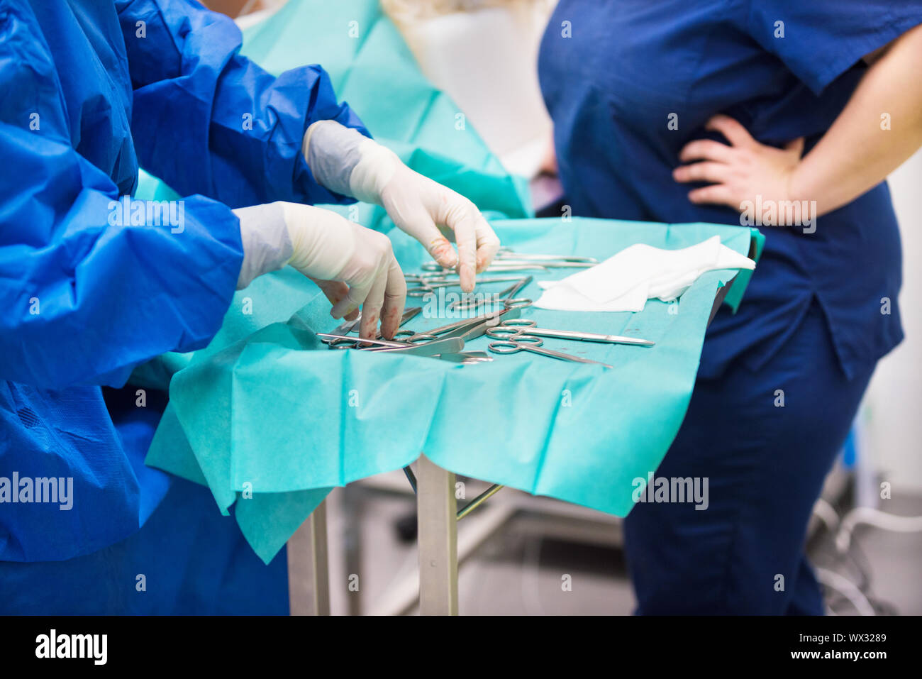 nurse preparing medical instruments for operation Stock Photo Alamy