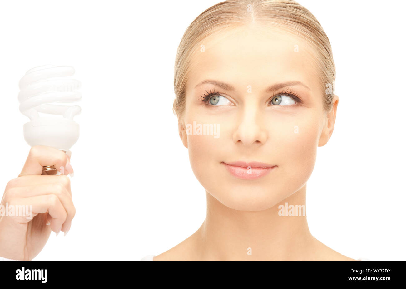 woman holding energy saving bulb Stock Photo