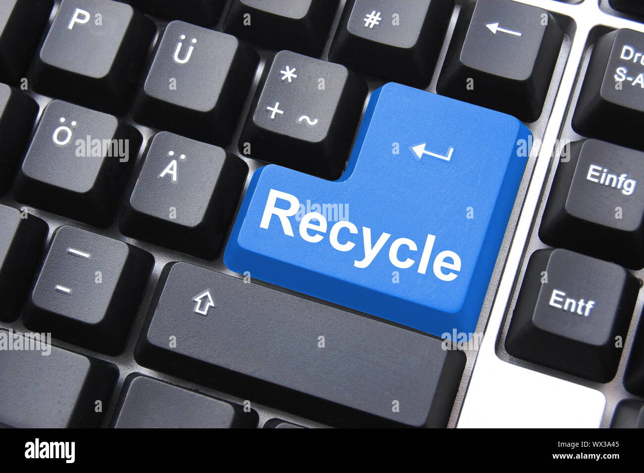 environmental protection with recycle button on keyboard Stock Photo