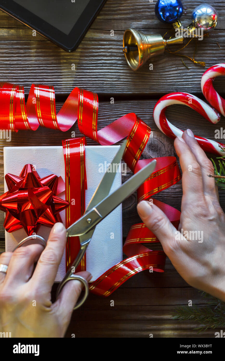 New Year's gifts, New Year 2019, Woman prepares New Year's gift Stock Photo