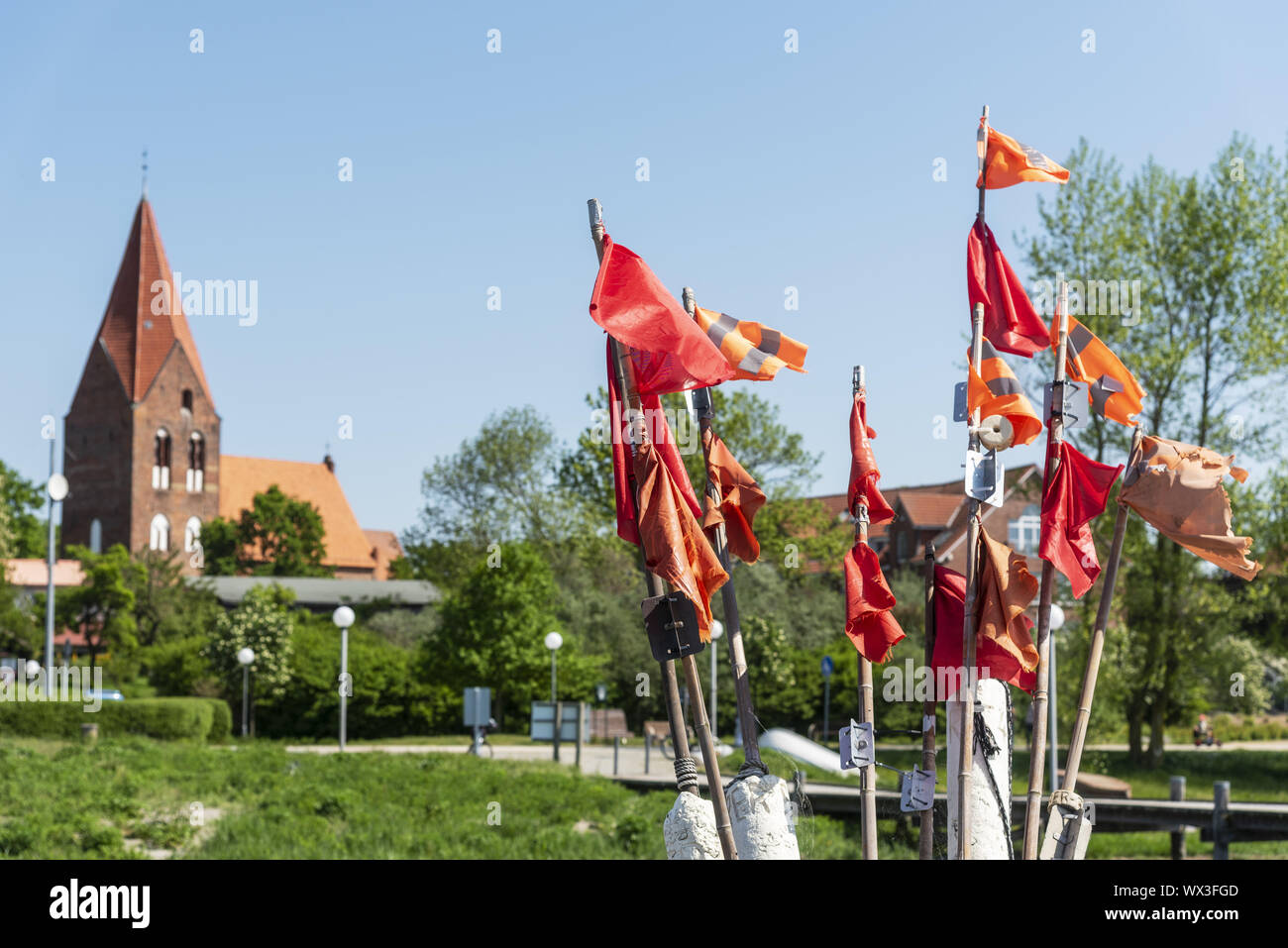 red flags, harbour, St. Johannes church, Rerik, Mecklenburg-Western Pomerania, Germany, Europe Stock Photo