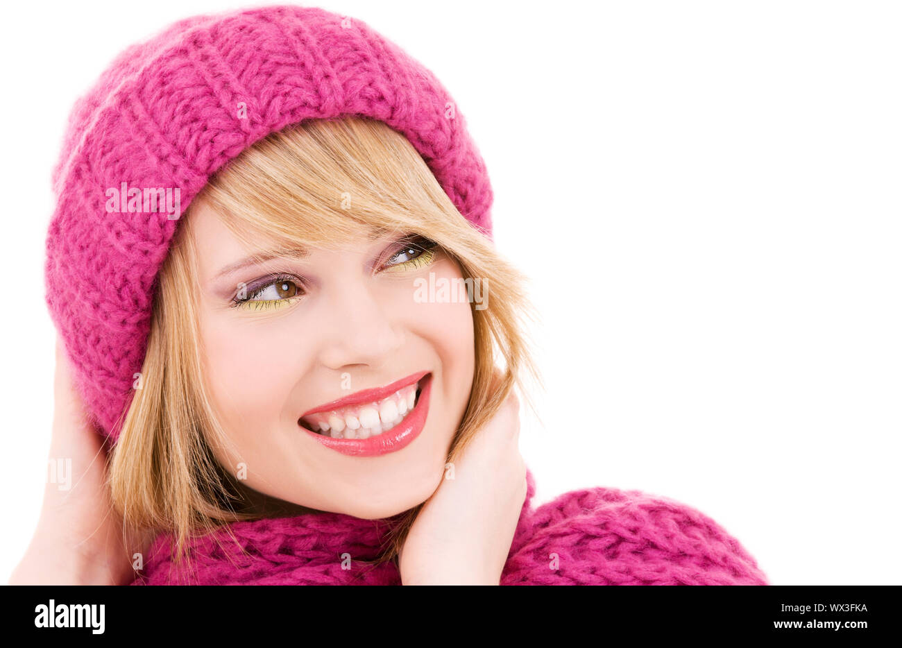 happy teenage girl in winter hat over white Stock Photo Alamy