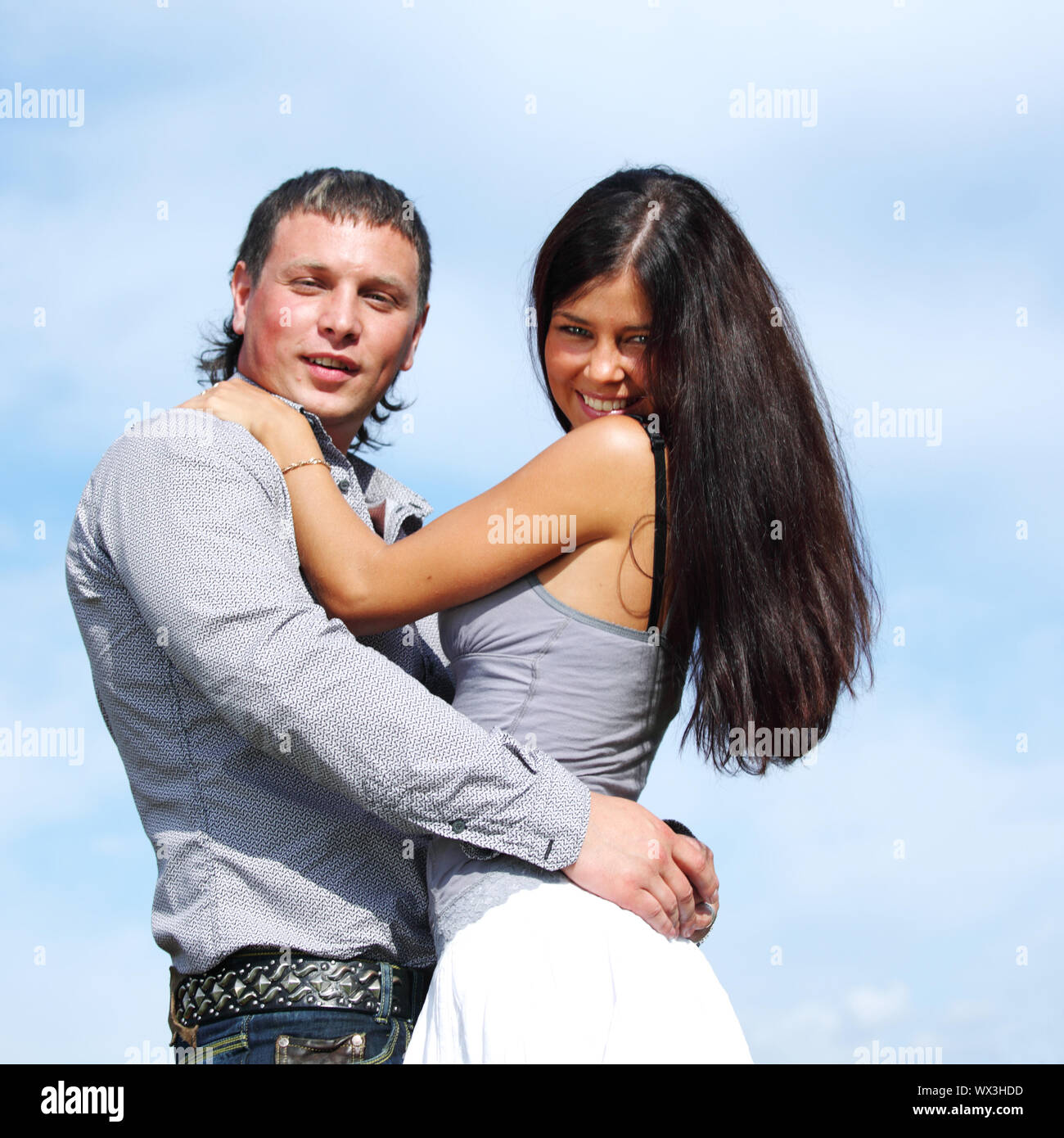 man and woman hug in the sky Stock Photo - Alamy