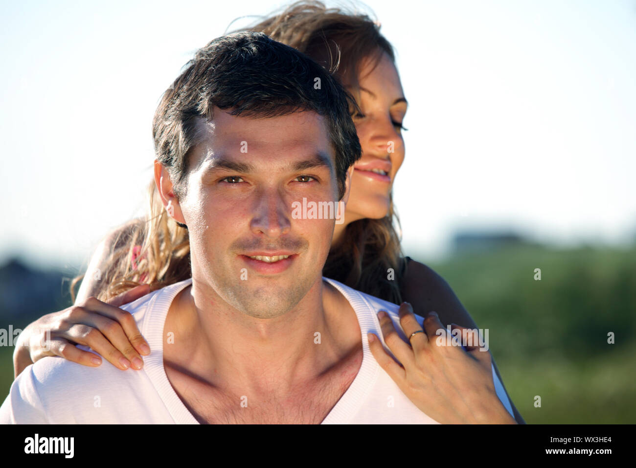 man and woman hug in the sky Stock Photo - Alamy