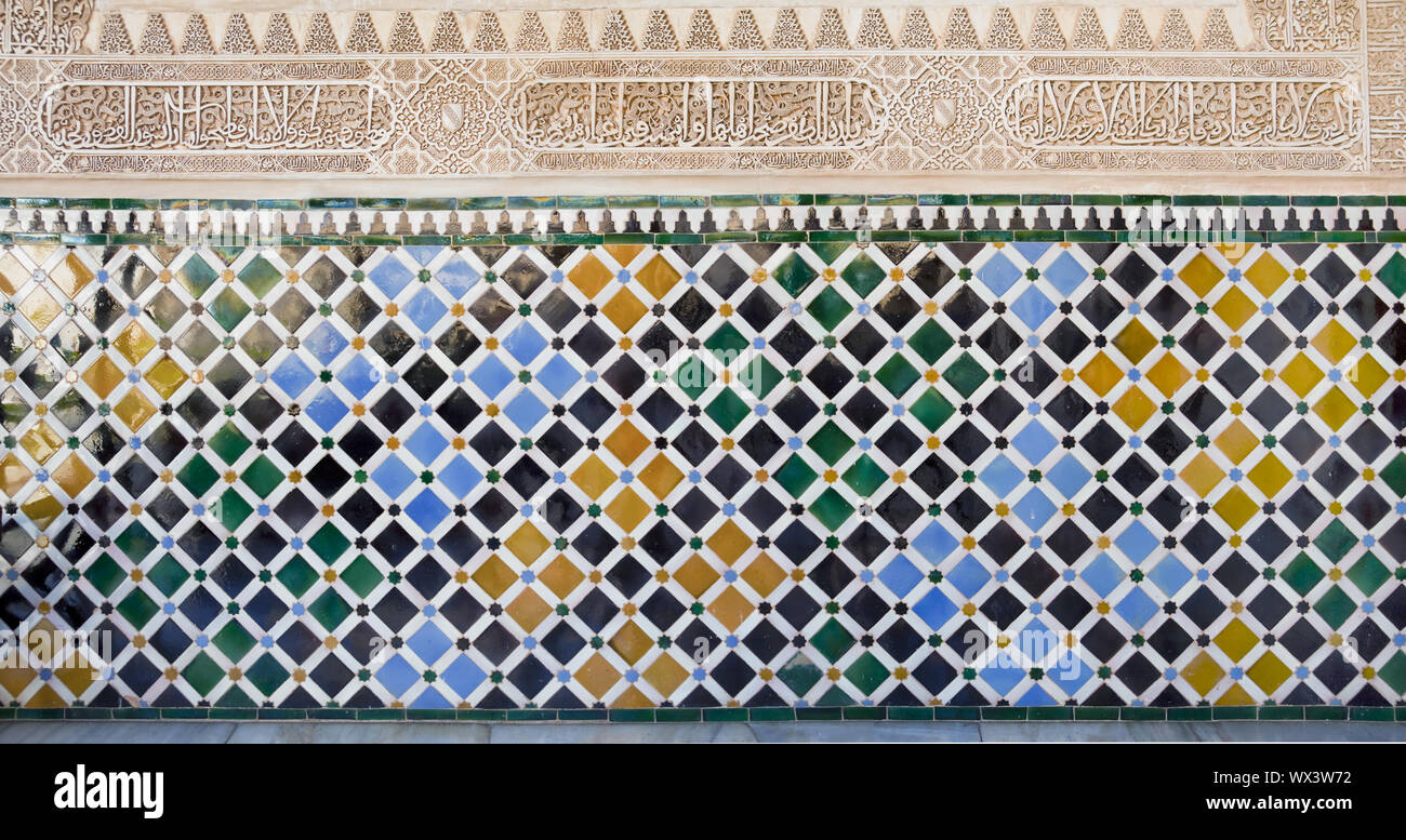 Antique wall tiles, in the Alhambra at Granada Stock Photo