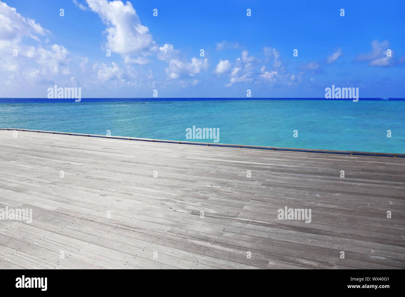 Beautiful wooden pier on the sea Stock Photo