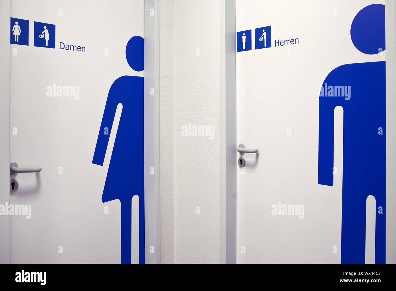 Two doors to toilets for women or men, Germany, Europe Stock Photo