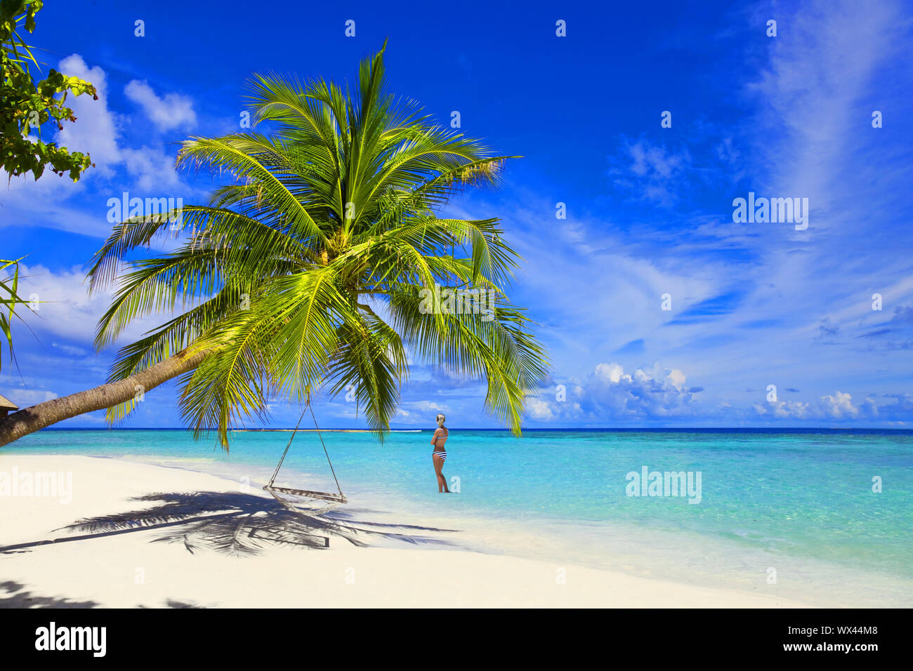 Beautiful Maldives beach with bikini model Stock Photo Alamy