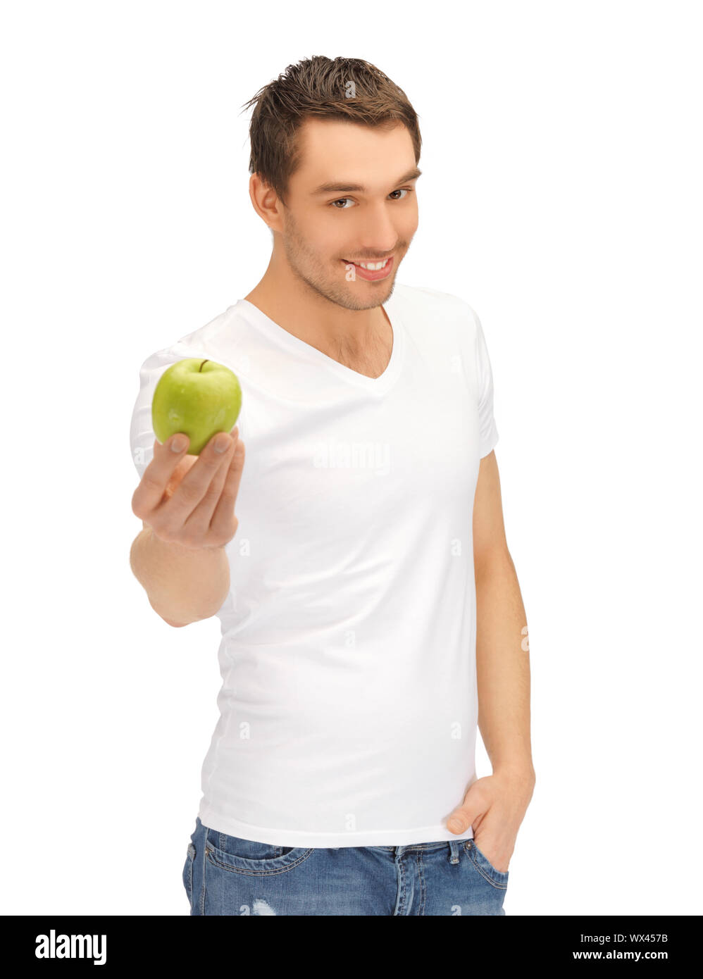 handsome man in white shirt with green apple Stock Photo - Alamy