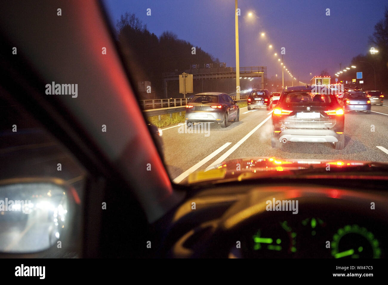 View from car to traffic, motorway at dusk, A7, Hamburg, Germany, Europe Stock Photo