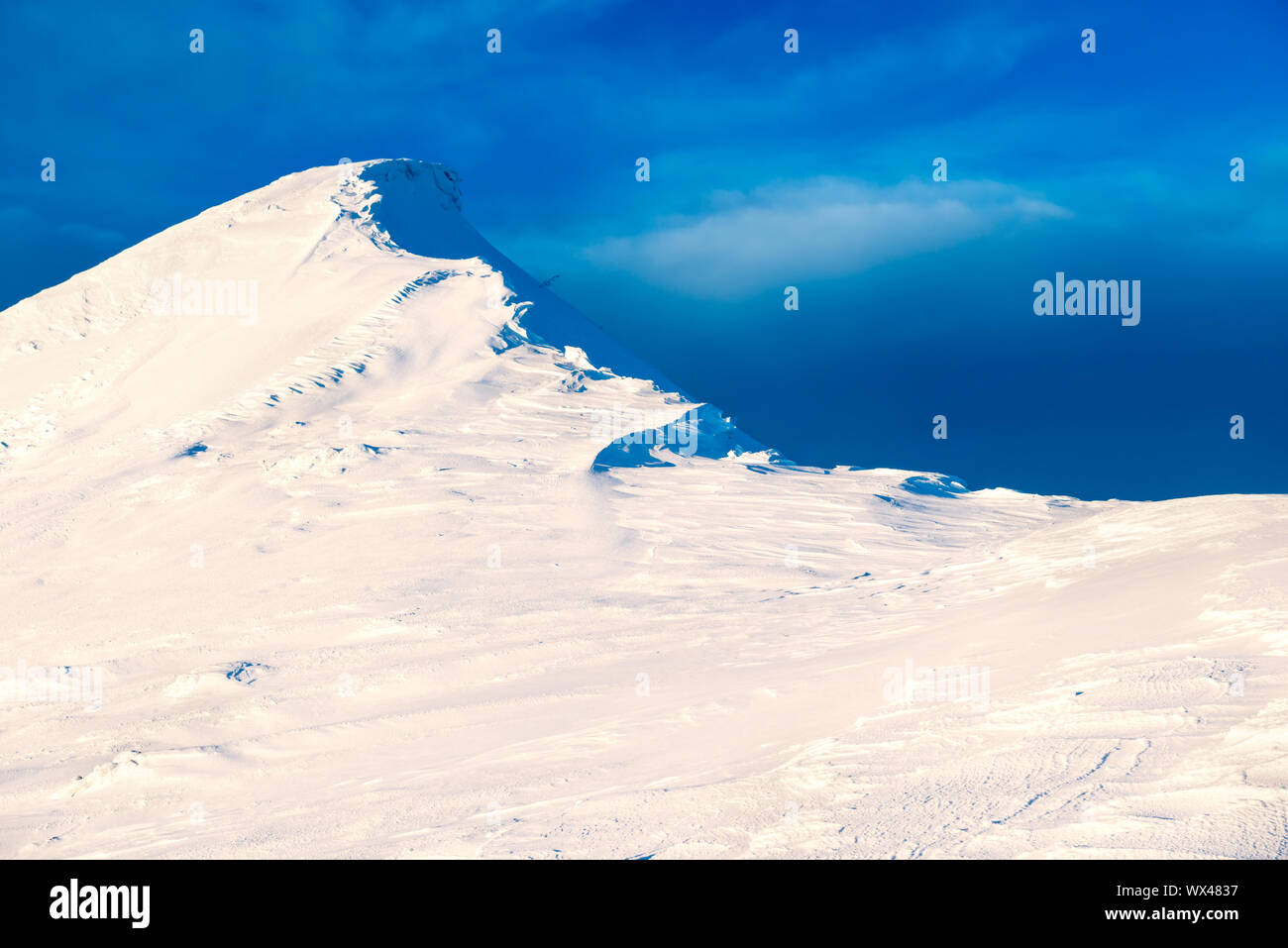 Mountain peak in snow Stock Photo
