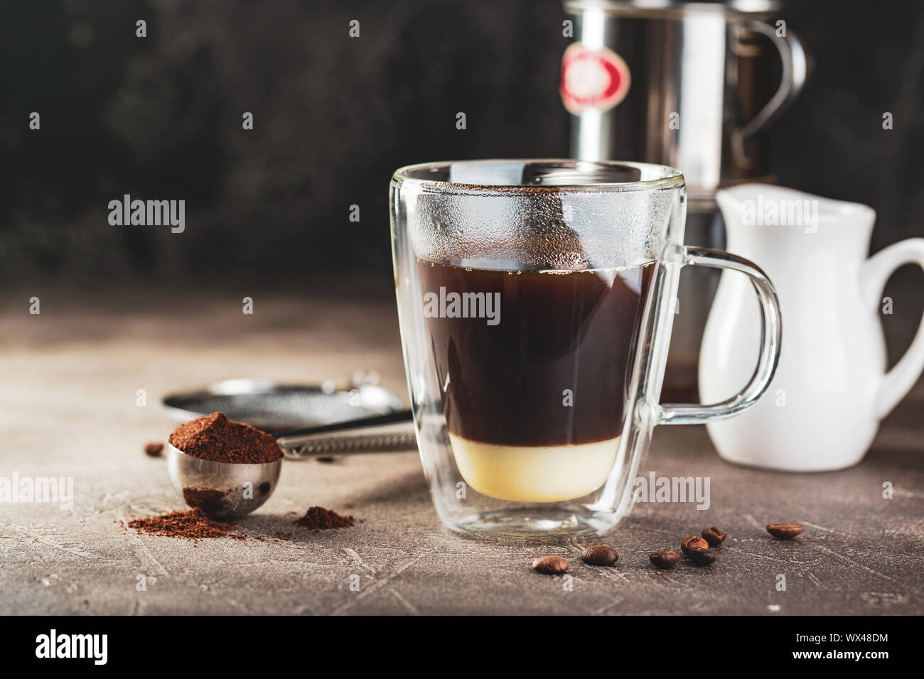 https://c8.alamy.com/comp/WX48DM/vietnamese-coffee-with-condensed-milk-in-glass-cups-and-traditional-metal-coffee-maker-phin-traditional-method-of-making-of-vietnamese-coffee-WX48DM.jpg