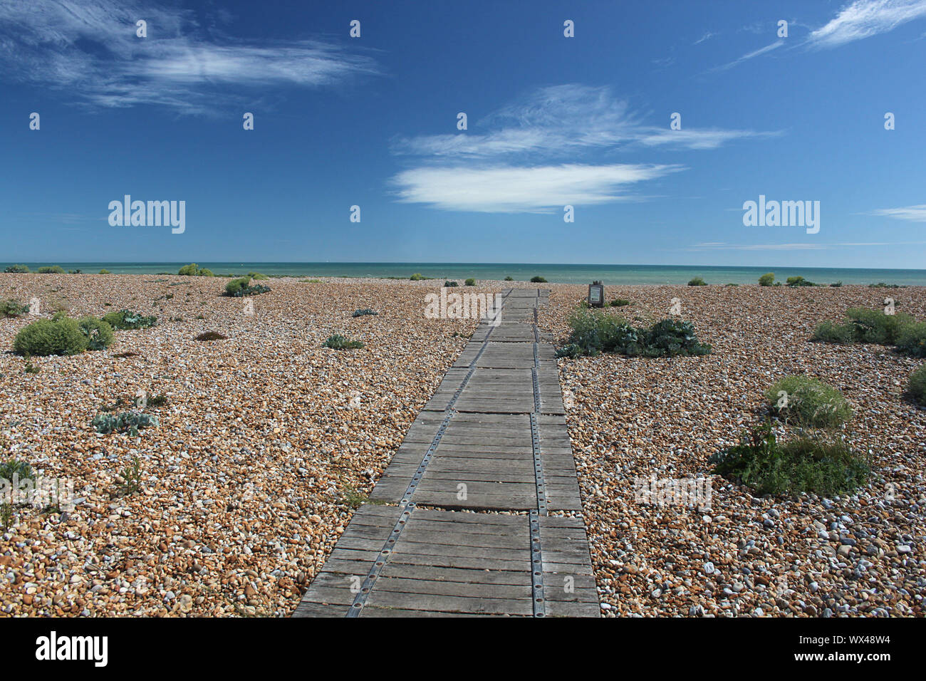 A Pathway Over The Shingle Beach At Rye Harbour In East Sussex Stock a-pathway-over-the-shingle-beach-at-rye-harbour-in-east-sussex-stock