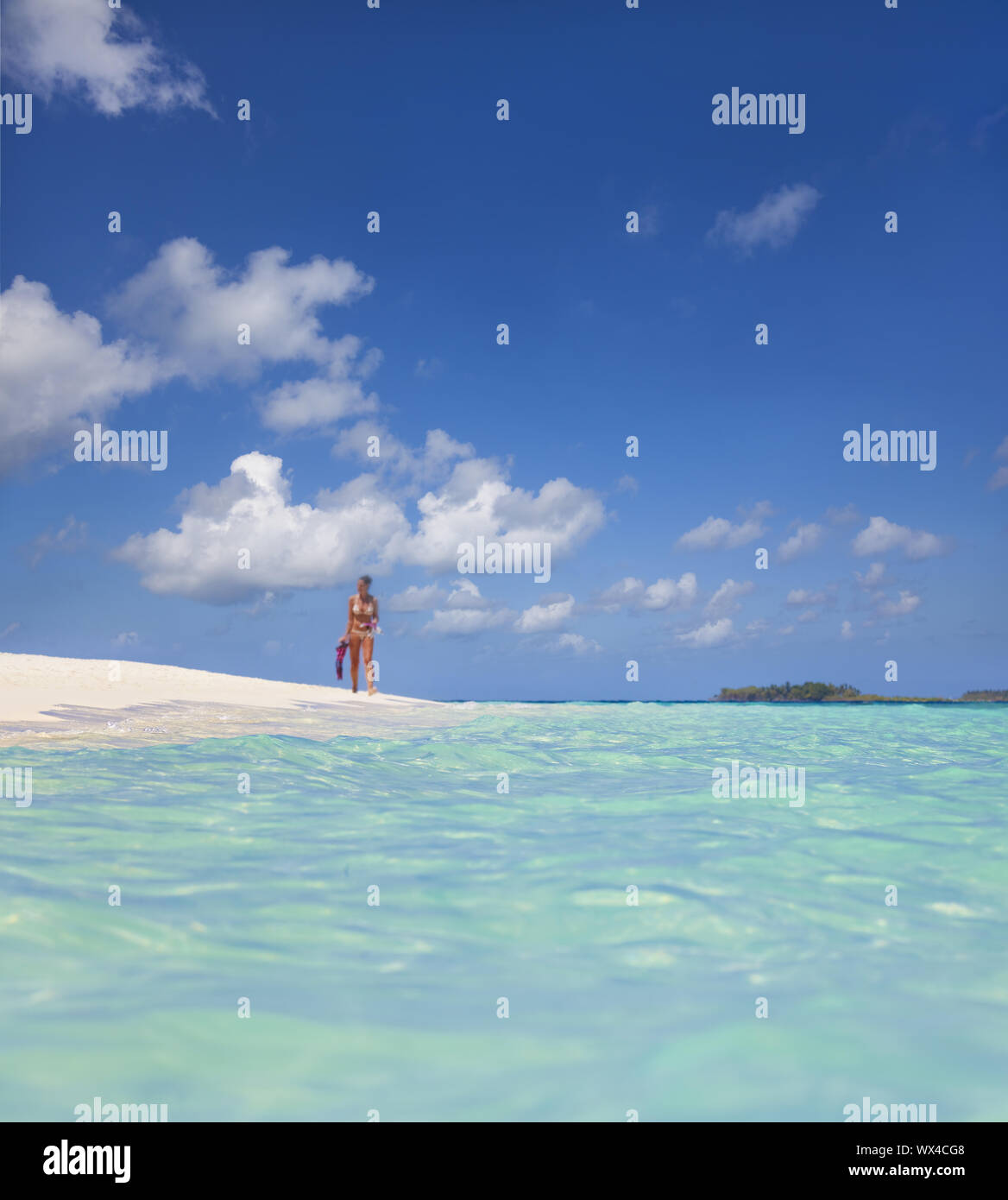 Beautiful Maldives beach with bikini model Stock Photo Alamy