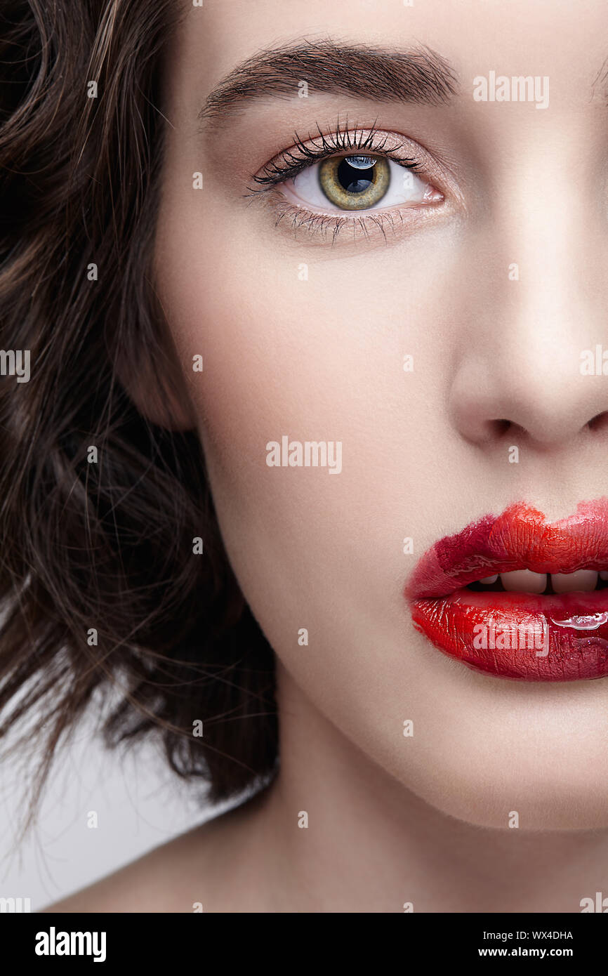 Closeup macro portrait of female face. Human woman half-face with ...