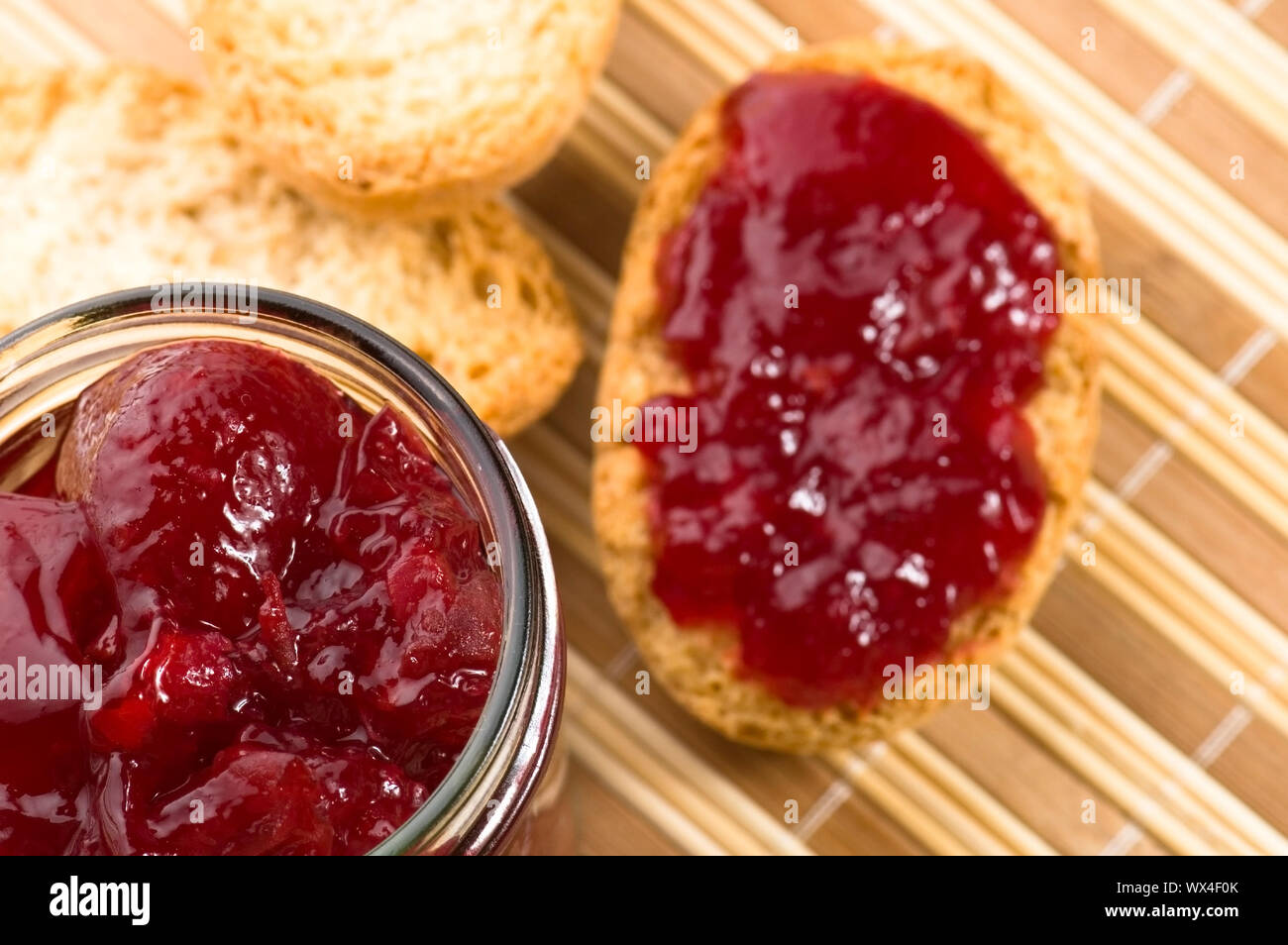 Breakfast of cherry jam on toast Stock Photo Alamy