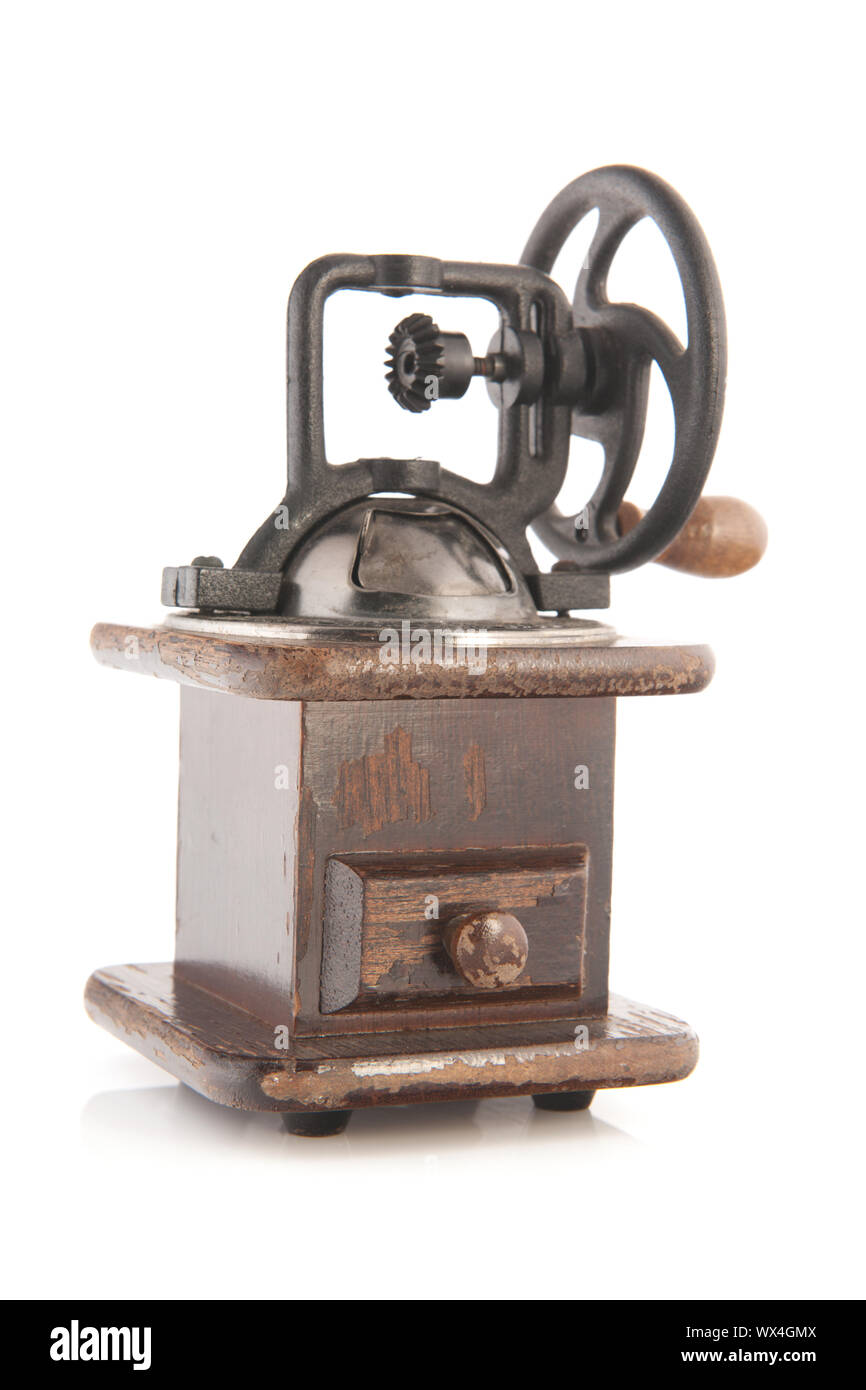Oldfashioned coffee grinder with wheel Stock Photo Alamy