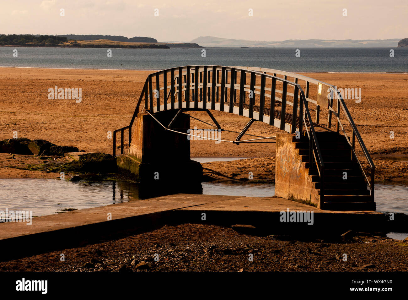 Belhaven bridge or 'Bridge to nowhere' in Belhaven bay. Dunbar is a town located in the south-east of Scotland. Stock Photo