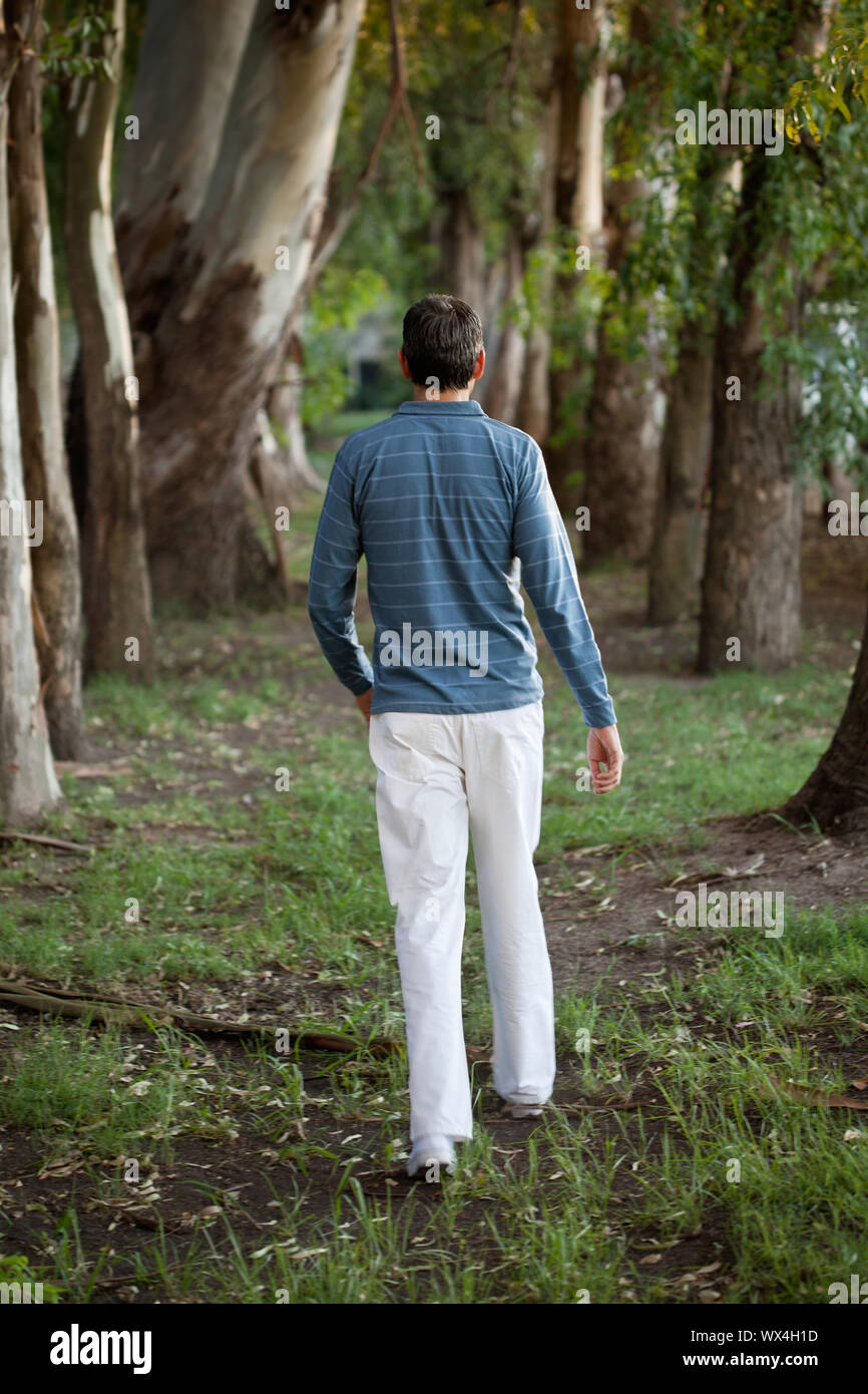 Lonely middle aged man walking hi-res stock photography and images - Alamy