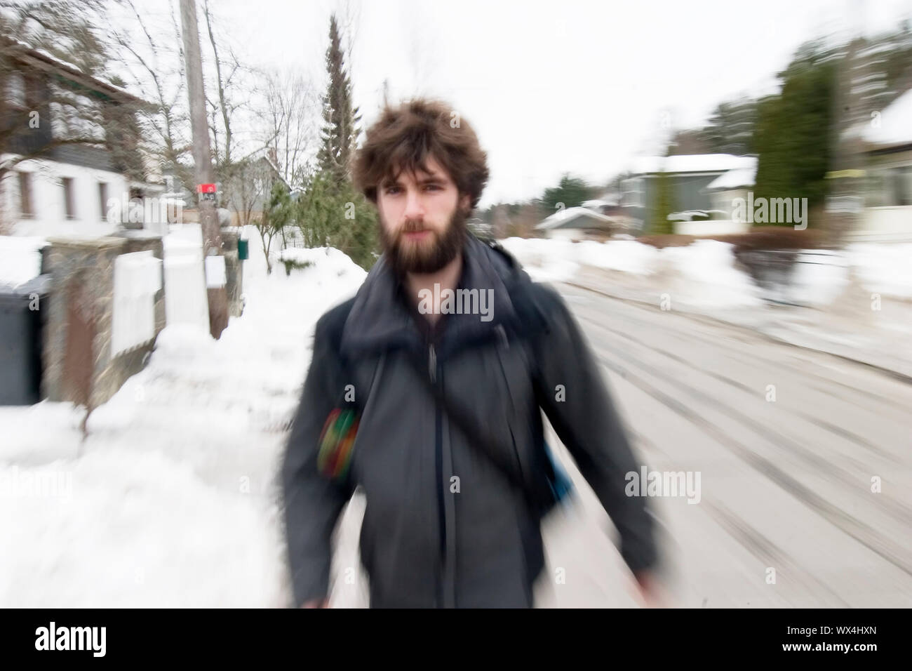 A motion blur abstract of a person walking in a hurry, a late rushing ...