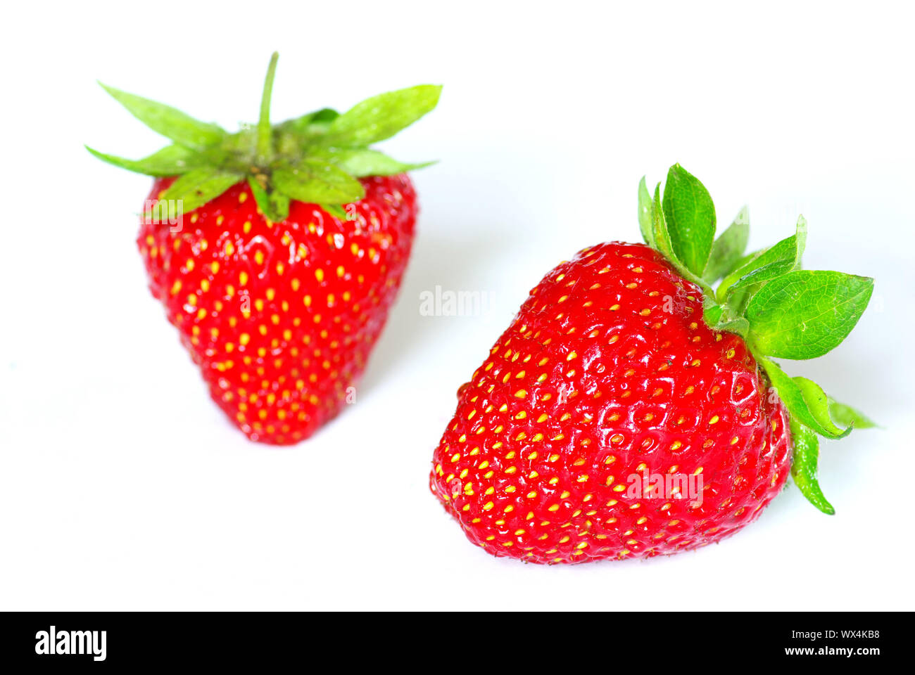 Fresh strawberries isolated on white background Stock Photo - Alamy