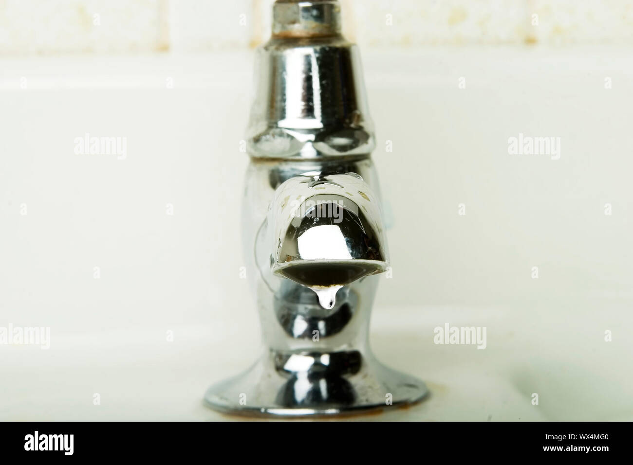 A Retro Sink Tap And Faucet A Detail Image Of A Water Drip