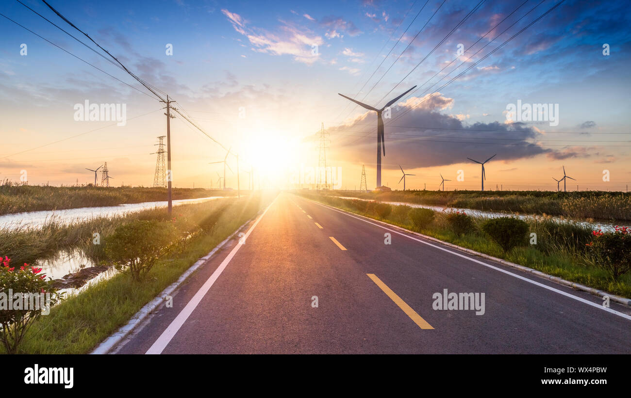 Empty road and wind turbine hi-res stock photography and images - Alamy