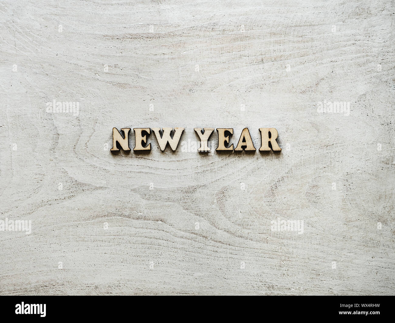 Words NEW YEAR on a white board Stock Photo - Alamy