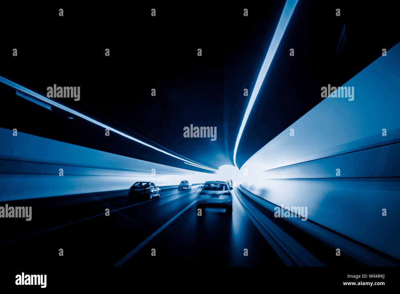 speeding car through tunnel Stock Photo