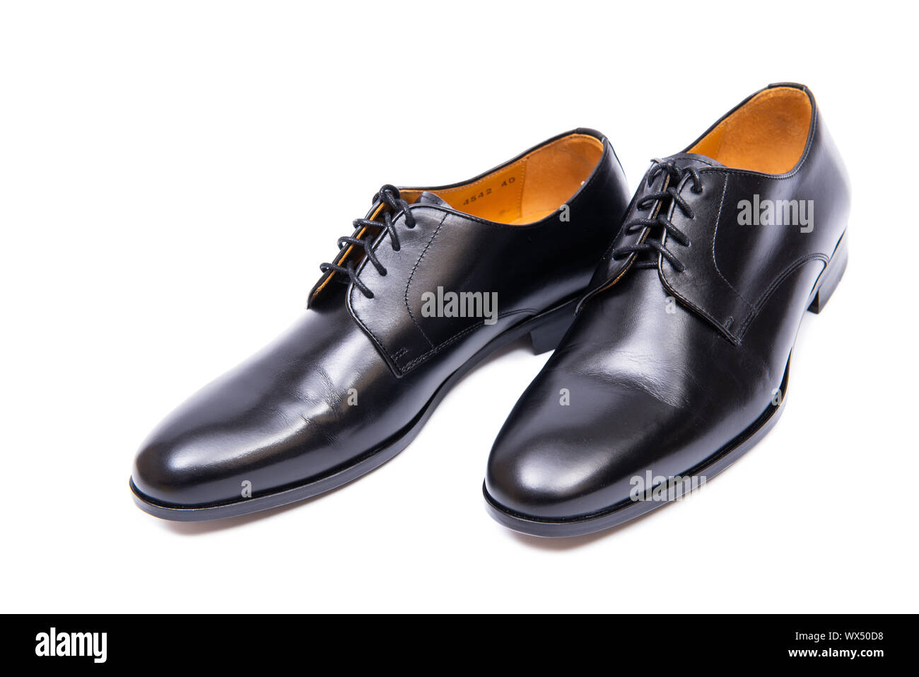 Black shoes isolated on white background Stock Photo - Alamy