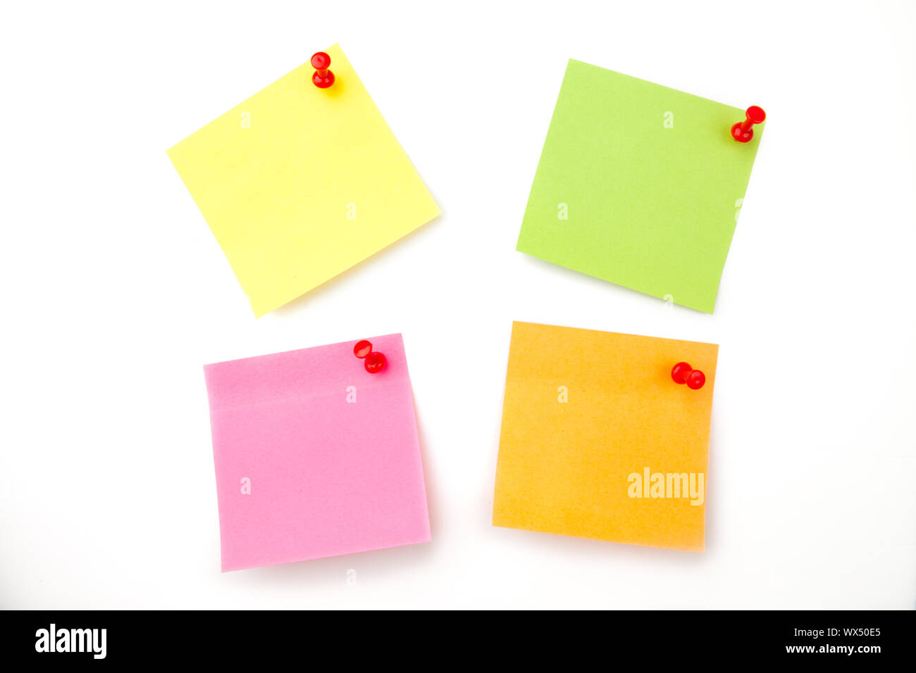 Four adhesive notes against a white background Stock Photo Alamy