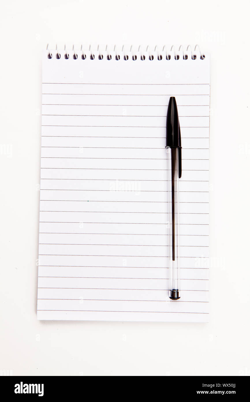 Notepad  with black pen sheet  against a white background Stock Photo