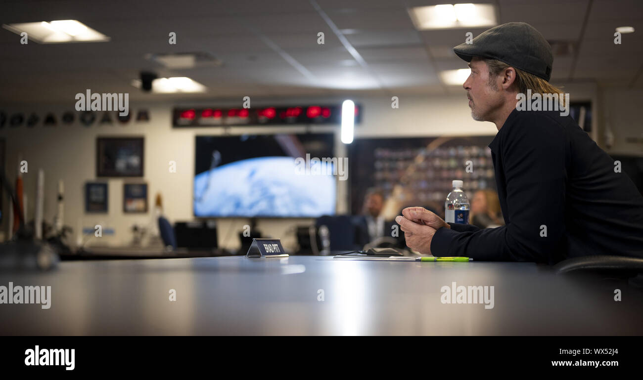 Washington, United States. 16th Sep, 2019. Actor Brad Pitt speaks with NASA astronaut Nick Hague who is onboard the International Space Station, on September 16, 2019, from the Space Operations Center at NASA Headquarters in Washington, DC. Pitt, who stars as an astronaut in his latest film 'Ad Astra,' spoke with Hague about what it's like to live and work aboard the orbiting laboratory. NASA Photo by Joel Kowsky/UPI Credit: UPI/Alamy Live News Stock Photo