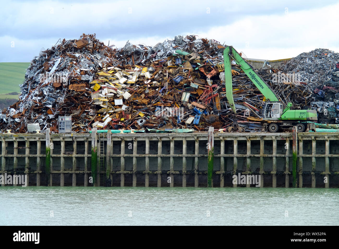 Scrap metal pile in Newhaven, East Sussex, situated next to the Marina and cross-channel ferry terminal. Stock Photo